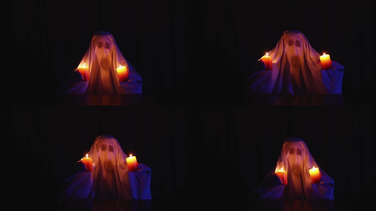 万圣节嘉年华庆祝派对: 家庭幽灵服装，展示燃烧的蜡烛