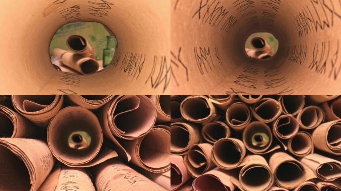 旧滚动库。老式卷轴堆叠在一堆上。