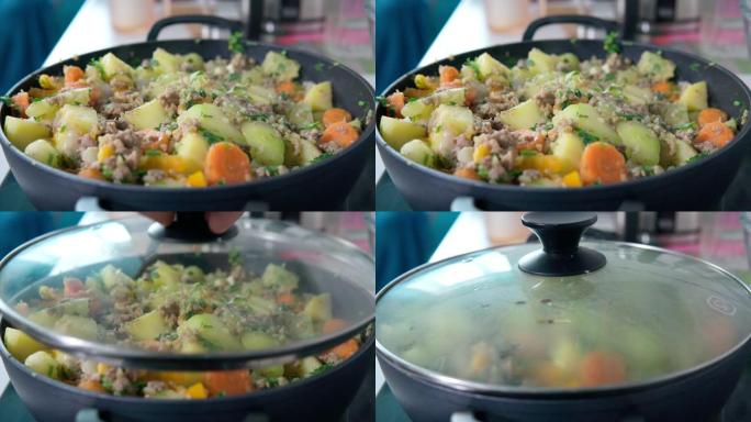 用土豆切碎的西葫芦胡萝卜炖煮。自制食品概念