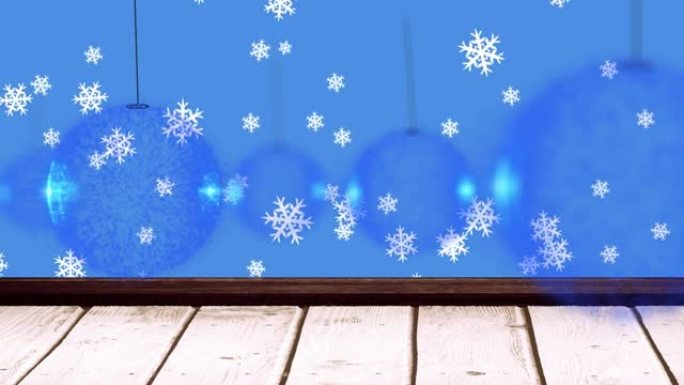悬挂在木板上的圣诞节小玩意儿和雪花的动画