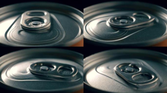 碳酸饮料的铁罐旋转，慢动作视频，中等，极端，大，大，长焦镜头，声音，饮料声音。