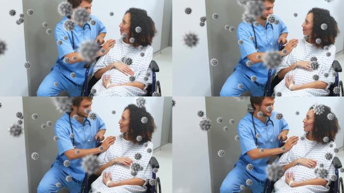 男性医生与孕妇坐在轮椅上的冠状病毒细胞的动画