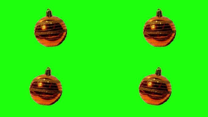 新年的橙色球在绿色色度键背景上平稳摆动。