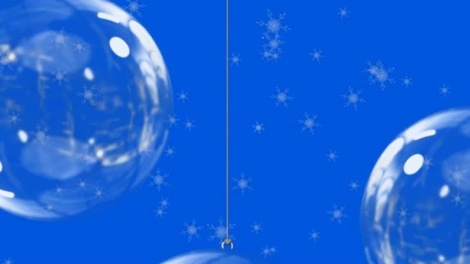 蓝色背景上的圣诞节摆设上的雪掉落动画