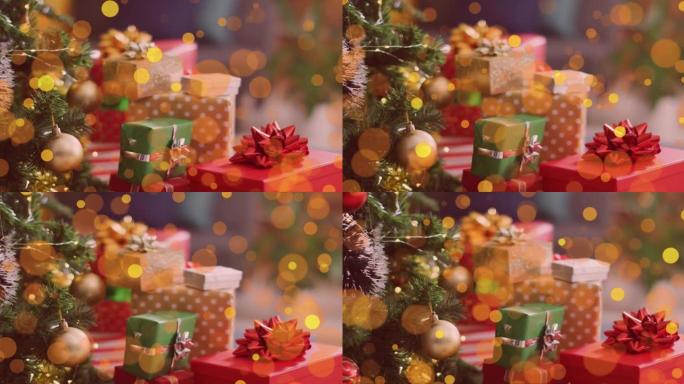 金色圆点星星掉落在礼物和背景中的圣诞树上的动画