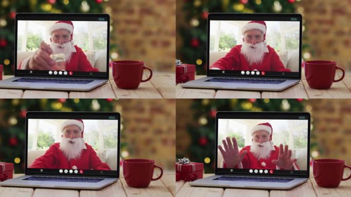 穿着圣诞老人服装的白人男子在笔记本电脑上进行视频通话，带有圣诞节装饰和树木