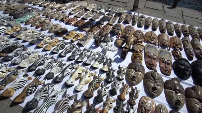 当地木制面具非洲工艺纪念品在埃及阿斯旺菲莱神庙码头出售