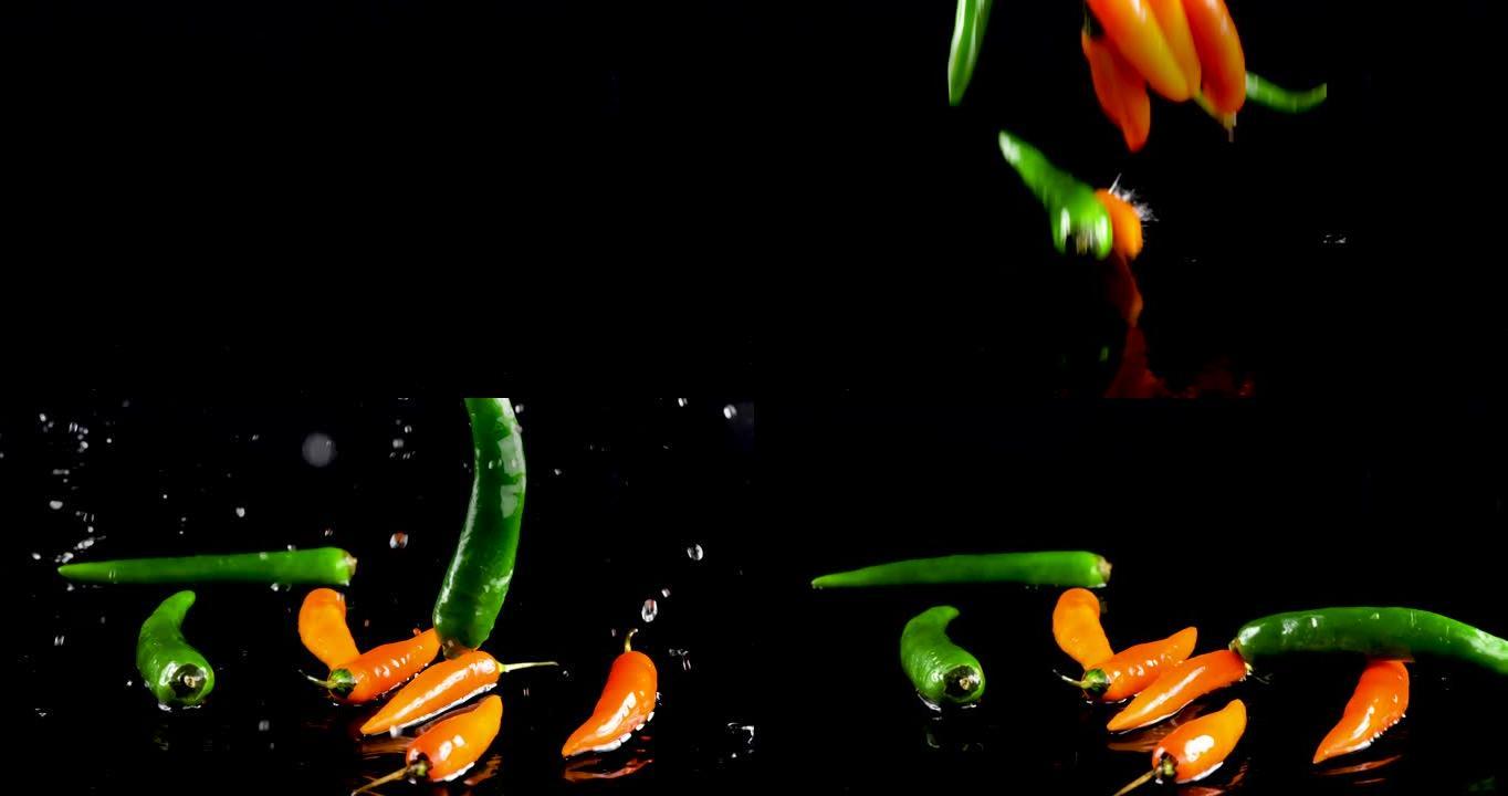 辣椒从水里反弹。慢动作
