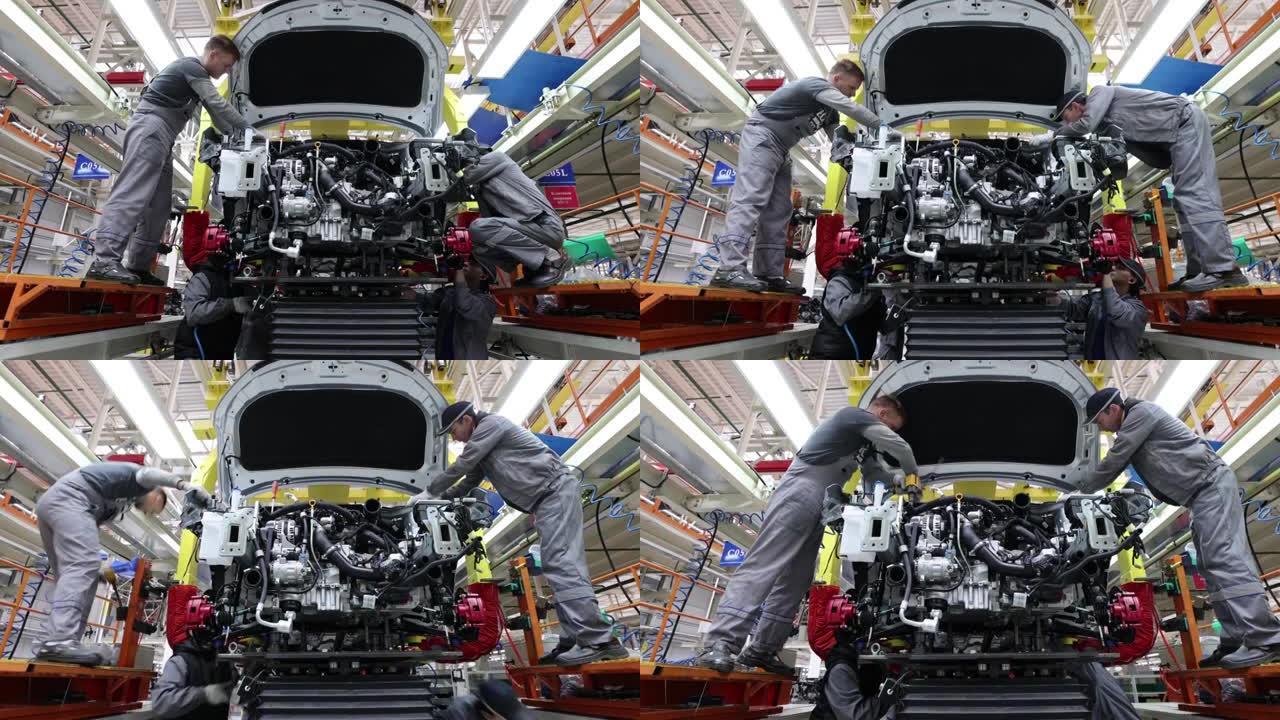 白俄罗斯鲍里索夫-2021年10月29日: 将发动机安装在新车的发动机舱中，这是一家现代化的高科技工