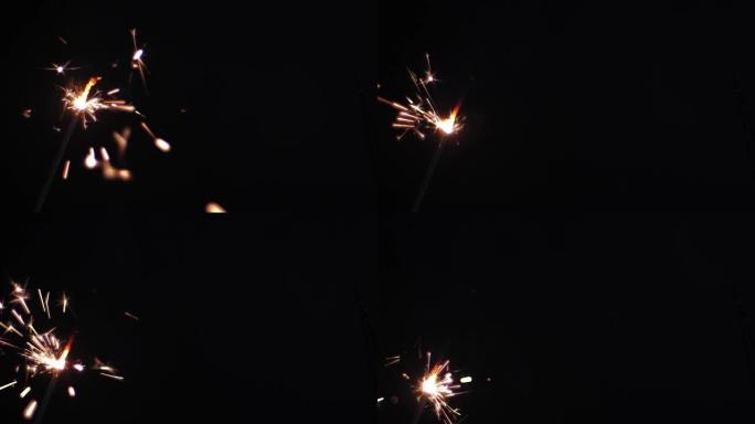 孟加拉火在黑色的背景下，燃烧的火花光 在庆祝视频剪辑股票片段。