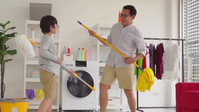 父子俩一边唱歌跳舞，一边打扫房子，一起做家庭活动的概念。