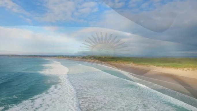 数字组成挥舞阿根廷国旗对抗海滩和海浪的鸟瞰图
