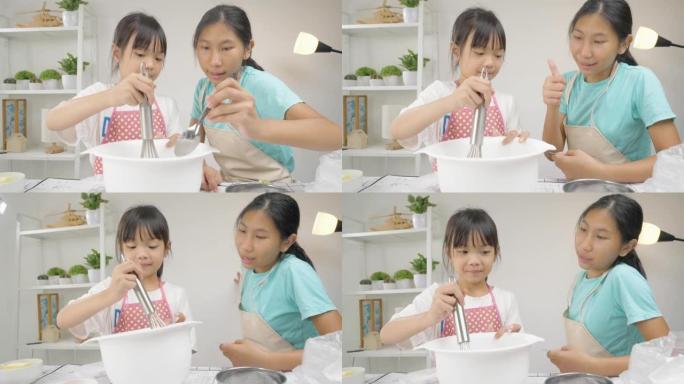 快乐的亚洲儿童在家里学习制作饼干，女孩在搅拌碗里搅拌面粉。