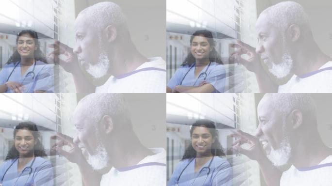 微笑的老人向窗外看，微笑的女医生在医院的复合