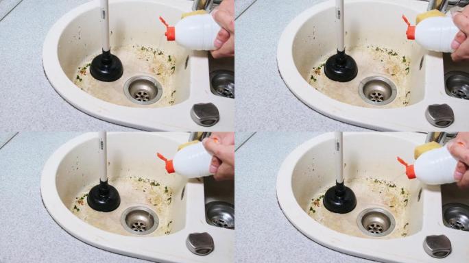 在家庭厨房用化学流体清理堵塞的水槽，慢动作