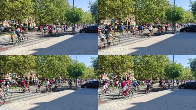 西班牙马德里-9月11日: 马德里街头的儿童和成人自行车节。