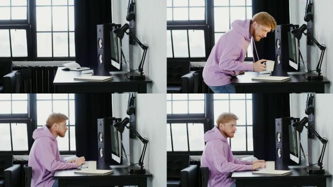 一个穿着便服的年轻人走近电脑坐下开始工作