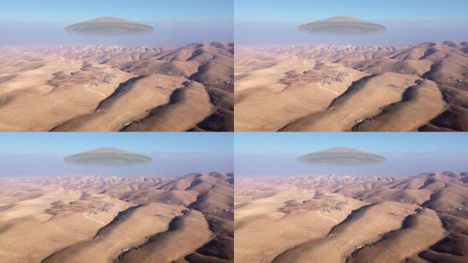 大型外星飞船飞碟飞过沙漠山脉，鸟瞰图