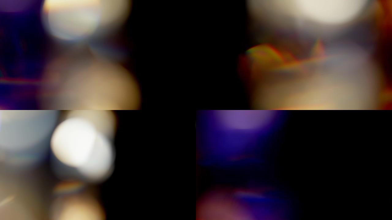 黑色背景上的彩色光泄漏镜头，镜头耀斑泄漏突发叠加过渡
