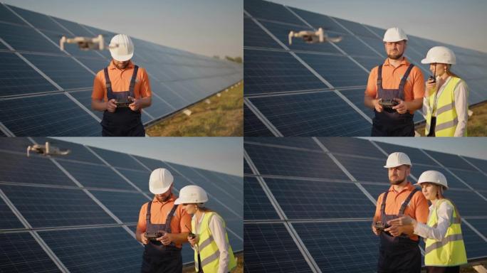 光伏太阳能发电厂戴着头盔和控制无人机的工业专家。太阳能电池板阵列安装。技术和生态。女性投资者检查工作