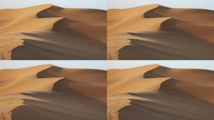 撒哈拉沙漠风中的沙丘中吹沙