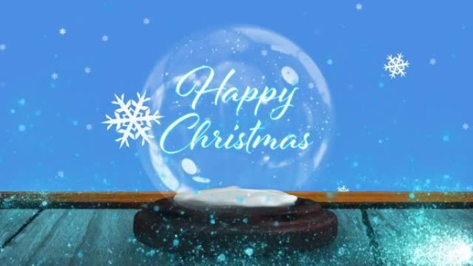 带有圣诞节文字和雪落在蓝色背景上的雪球动画