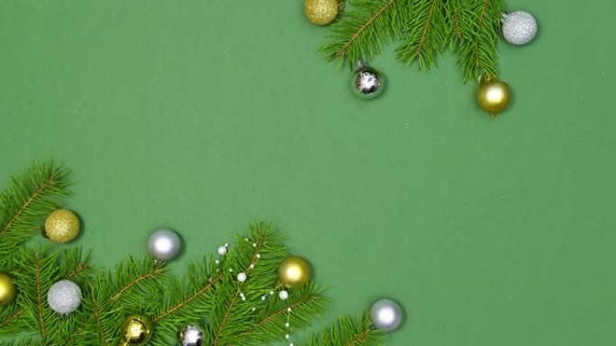 圣诞新年的花环出现在绿色主题的金银饰和装饰珍珠。停止运动