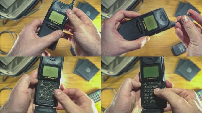 使用80年代90年代的复古手机。从上方看复古80年代90年代书桌的俯视图。