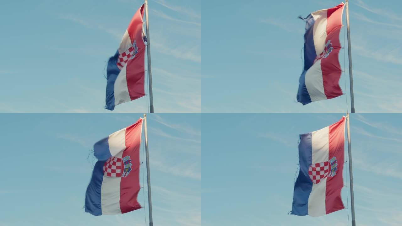 在多云的滑雪中，克罗地亚国旗在风中飘扬的美丽镜头