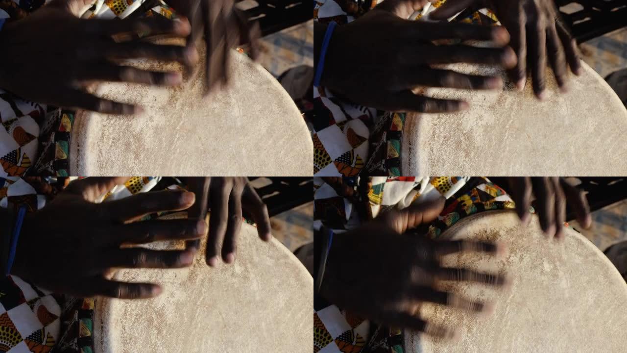 塞内加尔人演奏传统的djembe鼓。