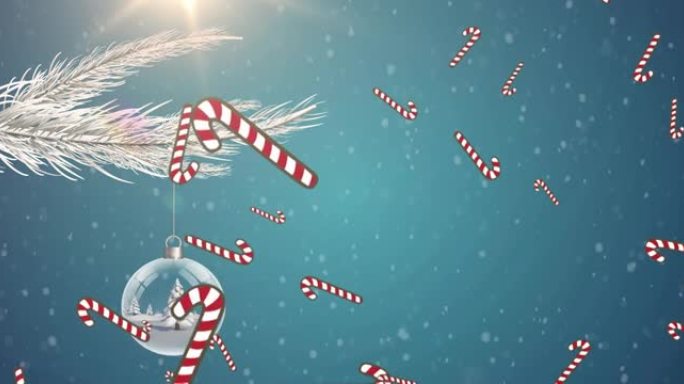 糖果藤条图标落在悬挂在蓝色背景树枝上的小摆设中的圣诞树上