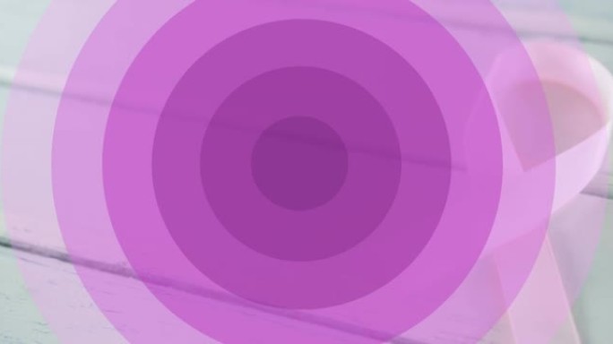 动画紫色的圆圈和希望与粉红色的丝带在白色木制背景的丝带