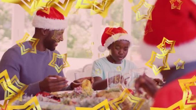 非裔美国人父亲和儿子戴着圣诞老人帽子吃圣诞大餐的明星动画