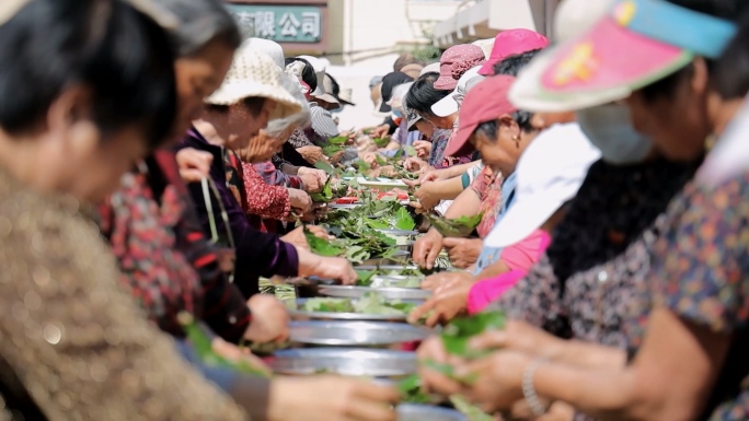 端午节社区包粽子活动