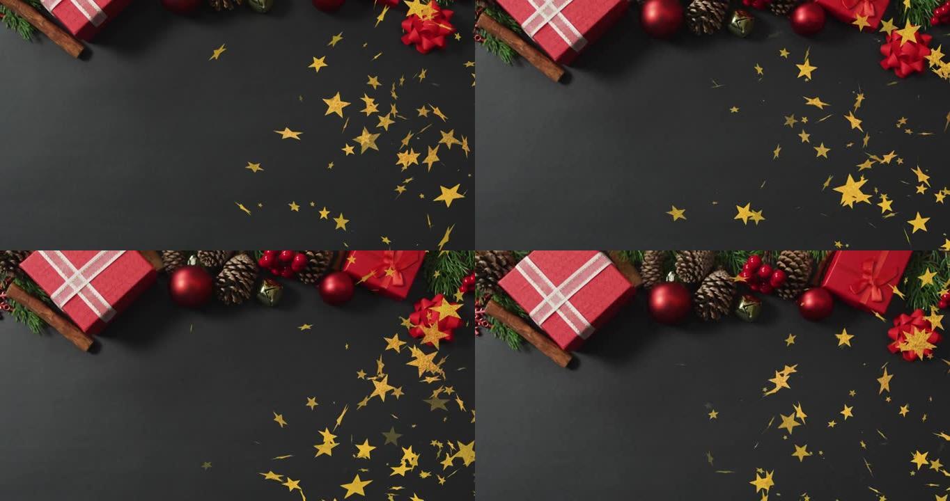 圣诞明星的动画落在带有装饰和复制空间的黑色背景上