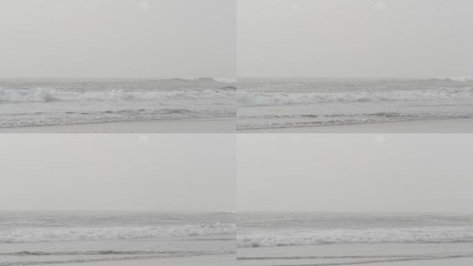 美国加利福尼亚州桑迪·米斯蒂海滩。太平洋海岸，海边浓雾。布鲁姆雾霾中的波浪。