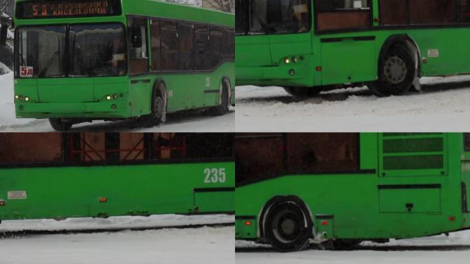 冬天。公共城市交通巴士在城市的雪道上行驶。慢动作降雪。交通恶劣的天气条件，暴风雪。道路交通事故的危险
