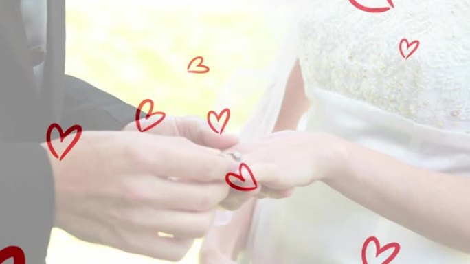 白种人夫妇戴着戒指的红心动画