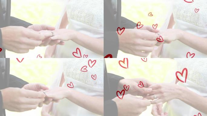 白种人夫妇戴着戒指的红心动画
