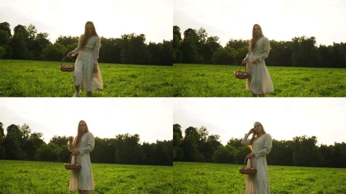 女人穿着太阳裙摆姿势站在绿草丛中拉直头发