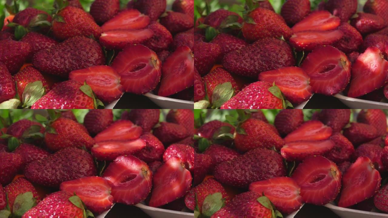 白色碗中摆放的红色美味草莓的全景