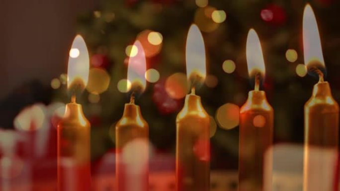 圣诞树和礼物上的蜡烛动画