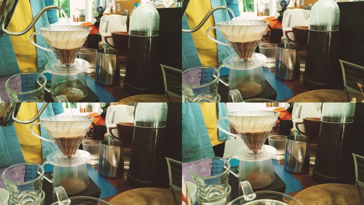 咖啡师使用复古制造商在咖啡馆制作美式咖啡