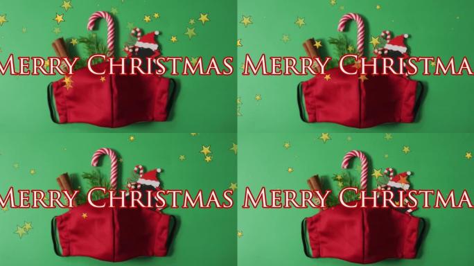 红脸面具和圣诞装饰品上的圣诞快乐问候文本动画