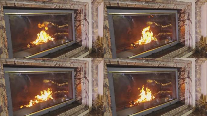 壁炉里着火了。木柴在壁炉里燃烧。漂亮的木头壁炉