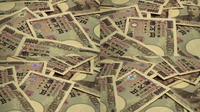 10,000日元钞票遍布整个桌子。