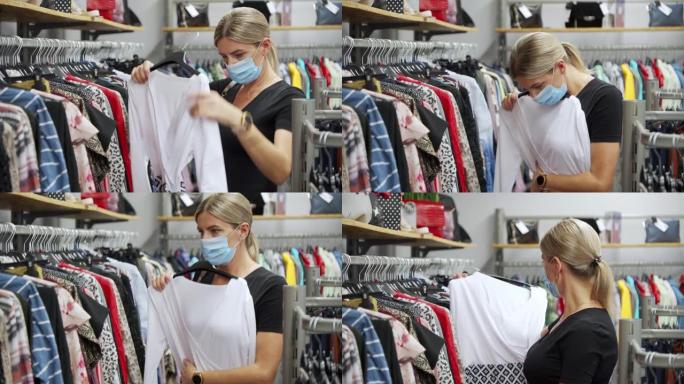 一个女人在服装店试穿一件衣服。时尚商店中的时尚物品选择。
