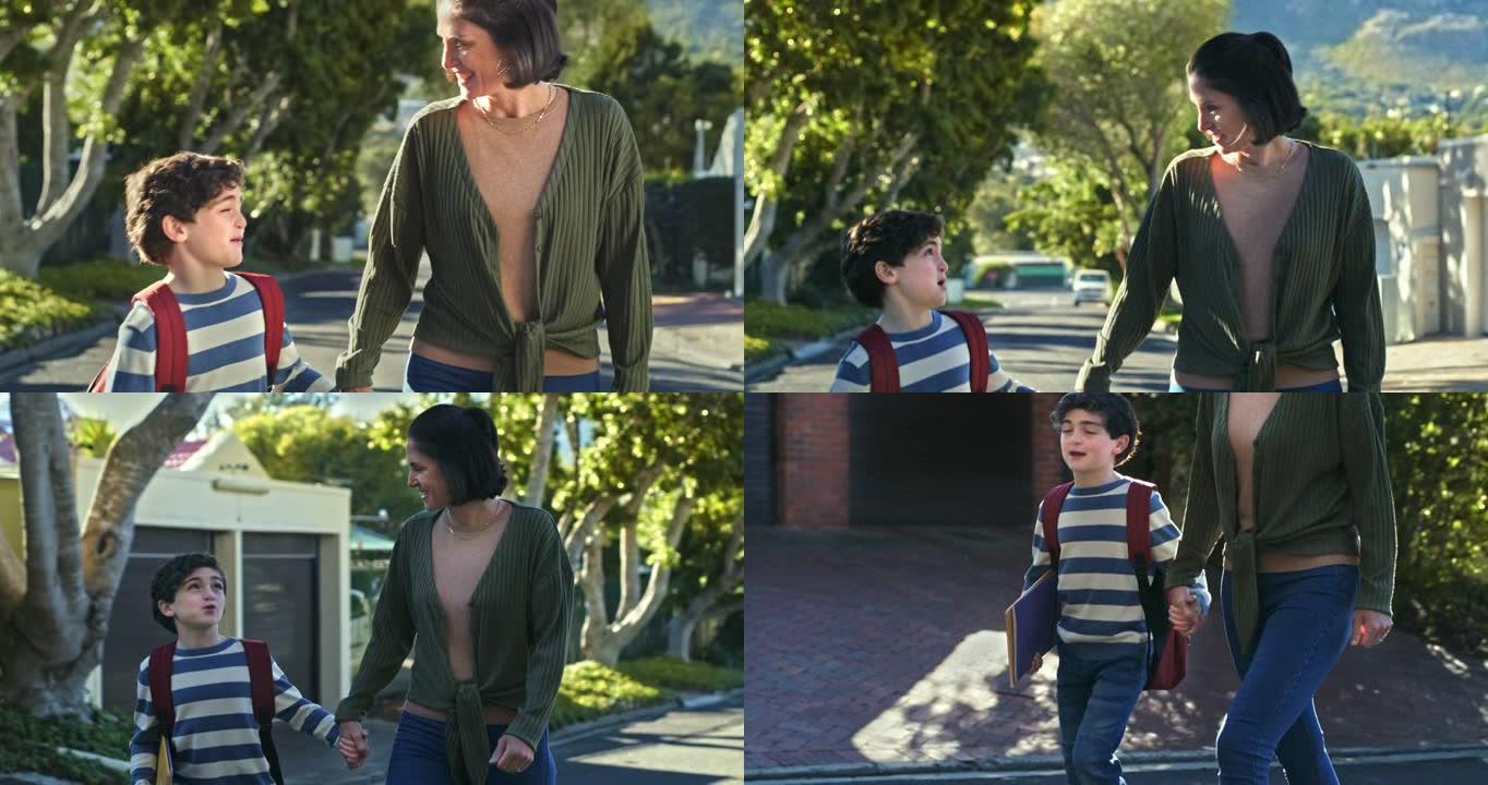 4k视频片段，一个小男孩在与母亲一起回家时戴着背包