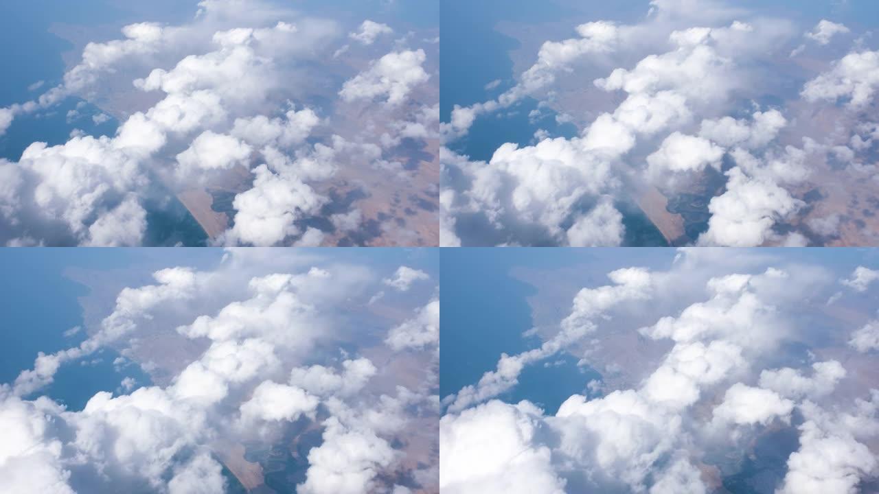 旅行时从窗户飞机看布朗山和土地的鸟瞰图