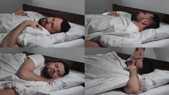 白人大胡子男人上床睡觉，在灯光室醒来的特写镜头。有魅力的家伙上床睡觉。早上好冷静觉醒4k